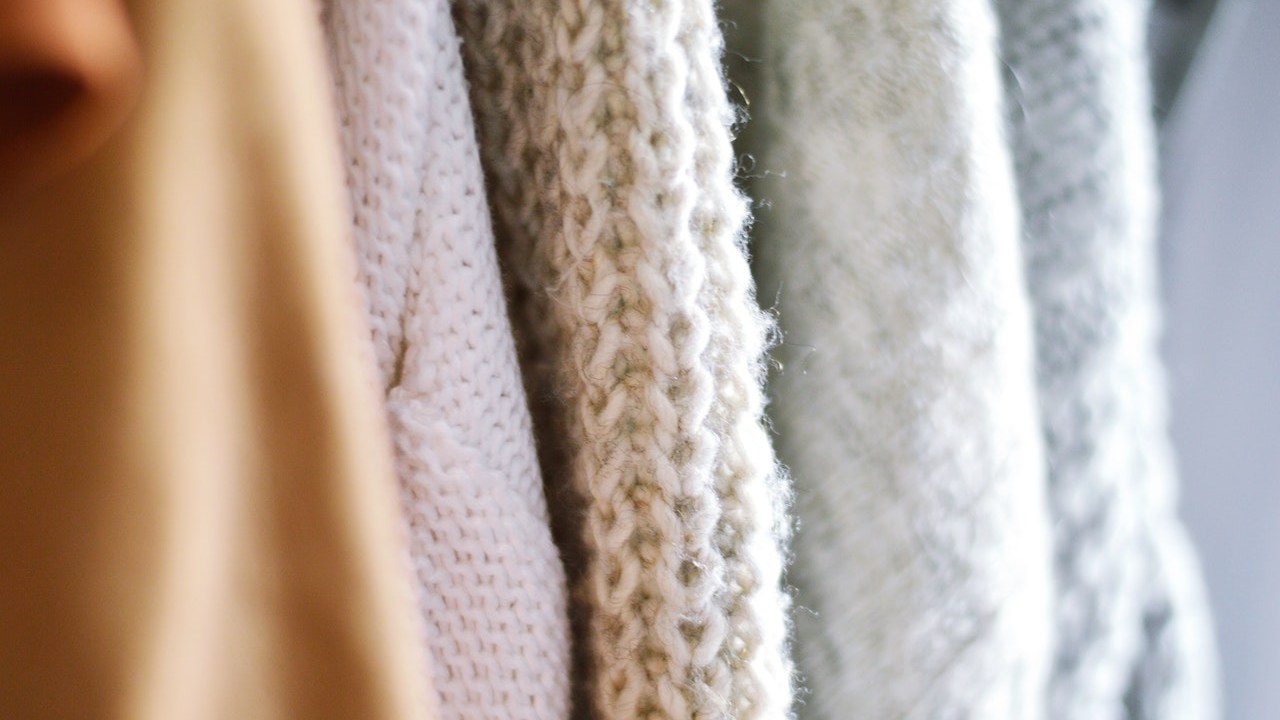 como limpiar lavadora deja bolitas en ropa