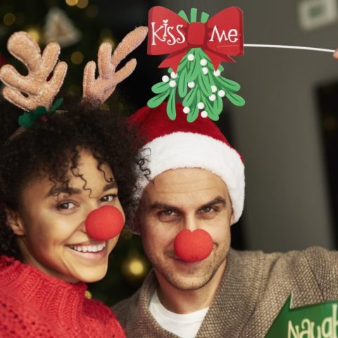 Qué significa besarse bajo el muérdago