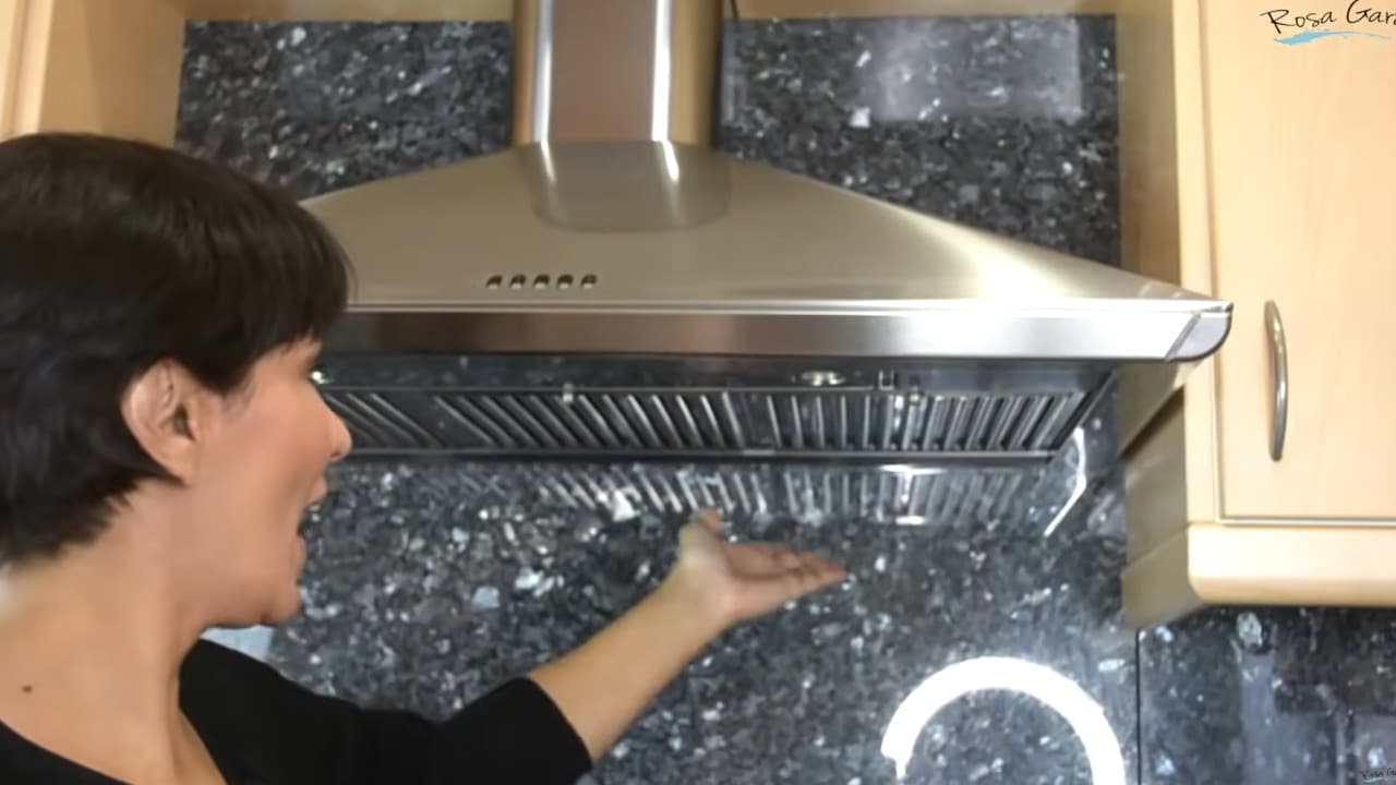 elimina el cochambre del extractor de la estufa